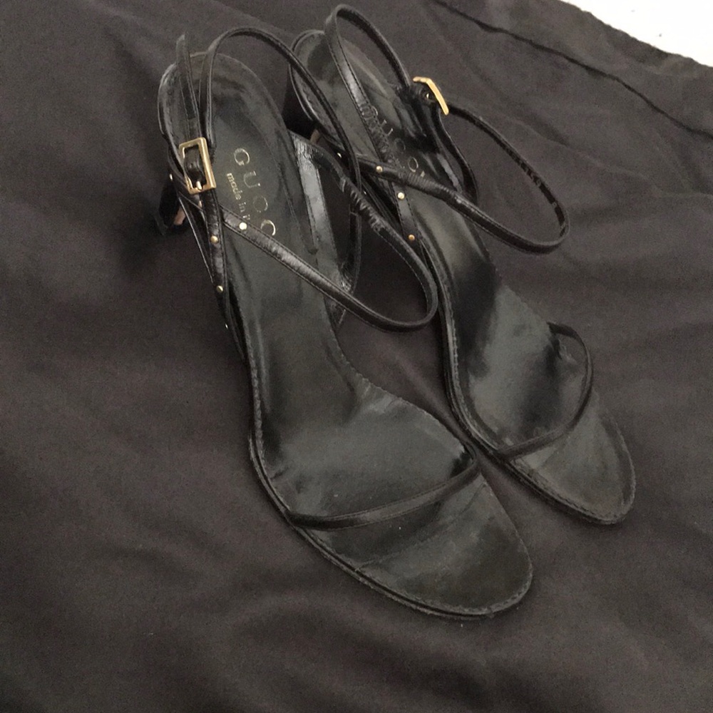 Strappy Gucci sandals.